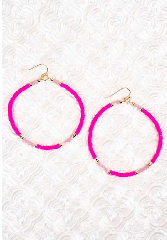 Hot pink beaded hoop earrings