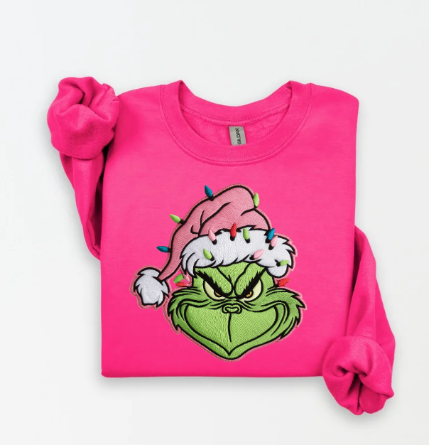 GRINCH WITH PINK SANTA HAT SWEATSHIRT.